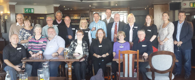 The October 2014 gathering in London: Back row, left to right: Eric Wagner, Wendy Wagner, John Barnett, Jeremy Burton, Angus Palmer, Roberta Roulstone, David Langan, Jiri Prasil, Ges Roulstone, Irina Prasilova, Jessica Roulstone, Gaylene Kendall and Mike Kendall. Front row, left to right: Andrew Elias, June Barnett, Ian Gamble, Jan Nelson, Area Coordinator Donna Marsh, Maggie Burton and Thomas Morris.