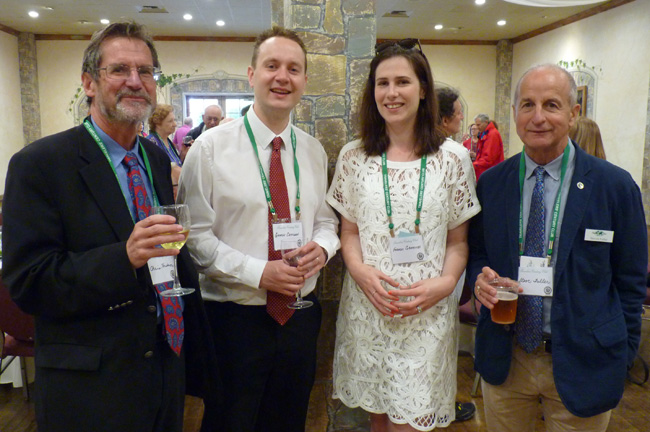 Board members Chris Hudson (l) and Steve Fuller (r) meet New Zealanders George Chitidden and Frances Griffiths, who stopped by on their way to Sweden